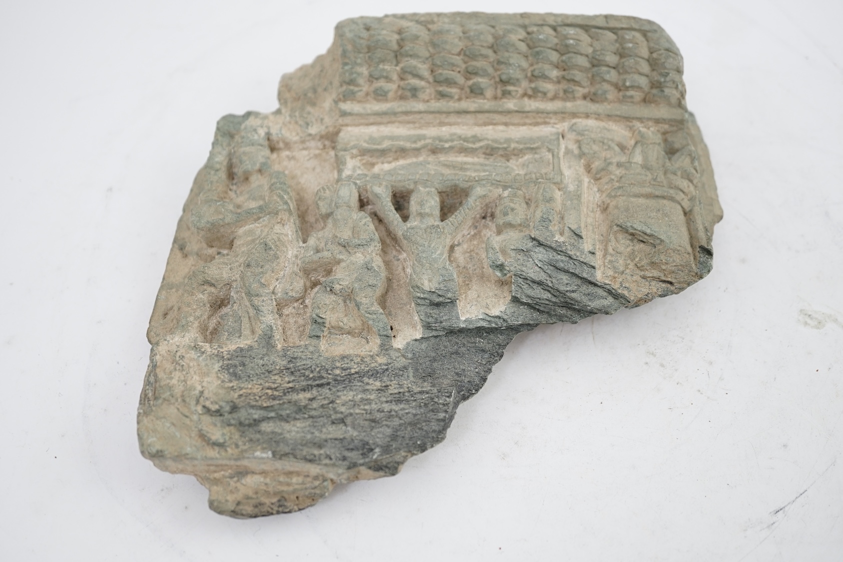 A Gandharan green schist relief fragment, probably 2nd/3rd century AD